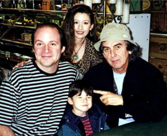 Steven with his wife, son, and the late George Harrison